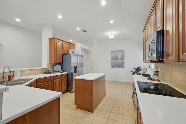 Recessed LED lighting and beautiful cabinets. | Image 8