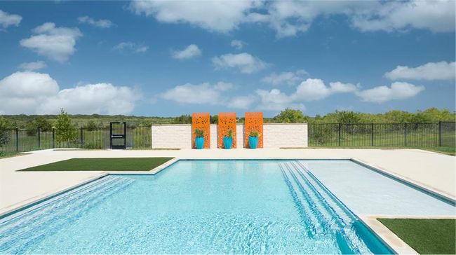View of pool with a patio | Image 33