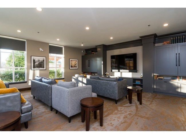 Living area featuring light carpet and recessed lighting | Image 22