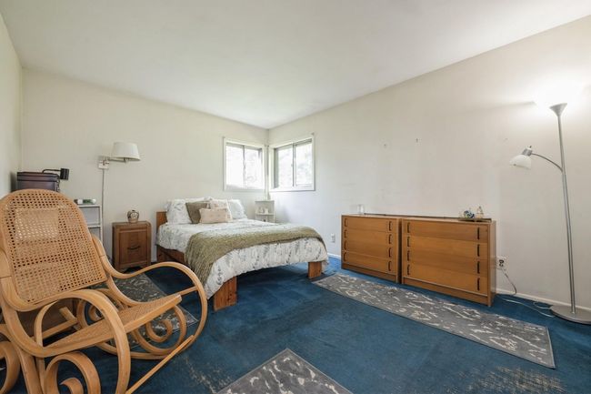 Carpeted Primary bedroom w/Hardwood flooring underneath | Image 12