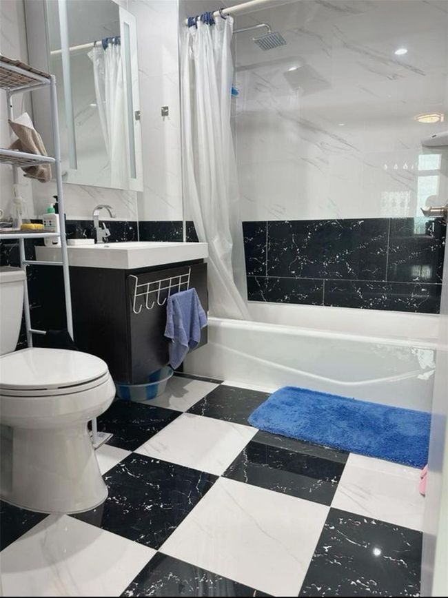 Full bath featuring shower / bath combo and vanity | Image 4