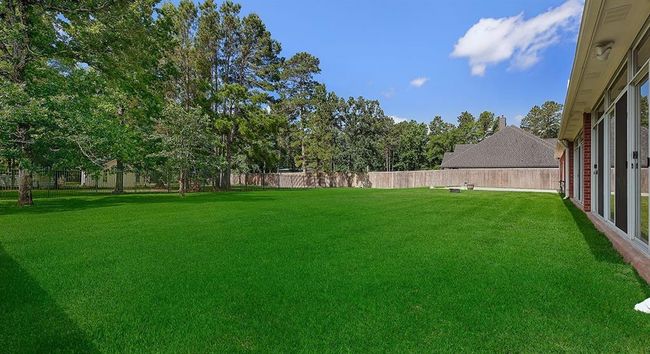 Backyard w/ Wrought Iron Fence to the Left | Image 28
