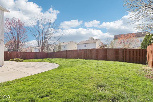 view of yard with a patio area and a residential view | Image 65