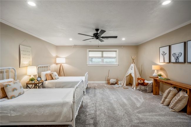 Carpeted bedroom with ornamental molding, recessed lighting, and ceiling fan | Image 27