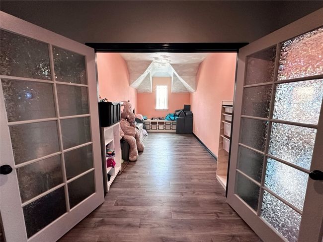Upstairs bonus room area that can be an additional living space, game room, or office | Image 23