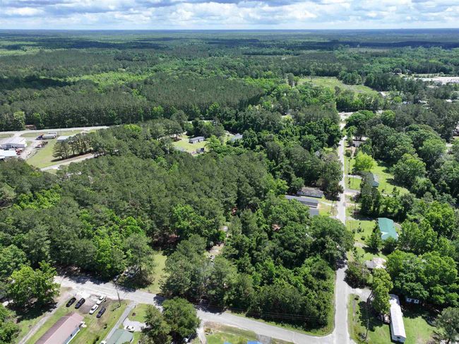 Birds eye view of property featuring a wooded view | Image 10
