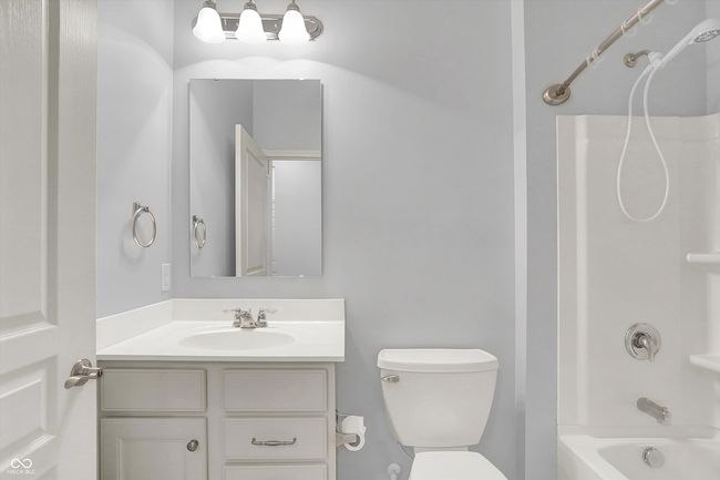 full bath featuring vanity and shower combination | Image 15
