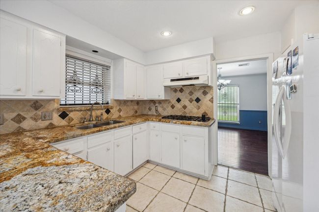 Open to dining room and family room | Image 16
