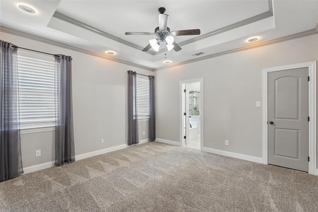 Master bedroom with recessed custom lighting that has LED accent lighting | Image 13