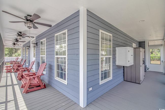 Porch featuring ceiling fan | Image 39