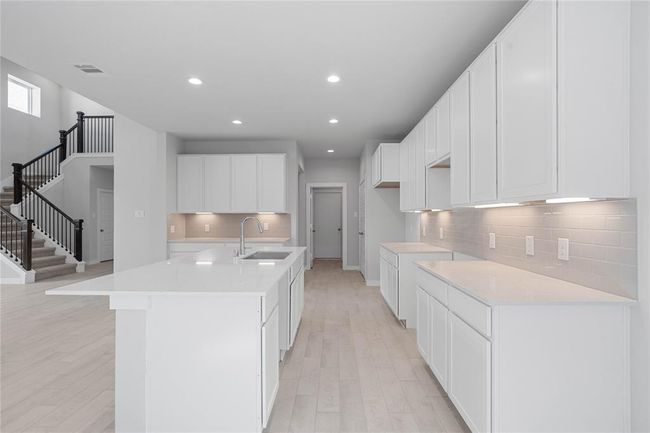 This photo is for illustrative purposes only and is not to be considered an exact replica of the finished home. Rendering does not match the finished product in terms of features, colors, landscaping, etc. Pricing, specifications, square footage and materials are subject to change at any time and without notice. | Image 4