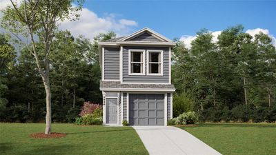 View of front of home featuring a garage and a front lawn | Image 1