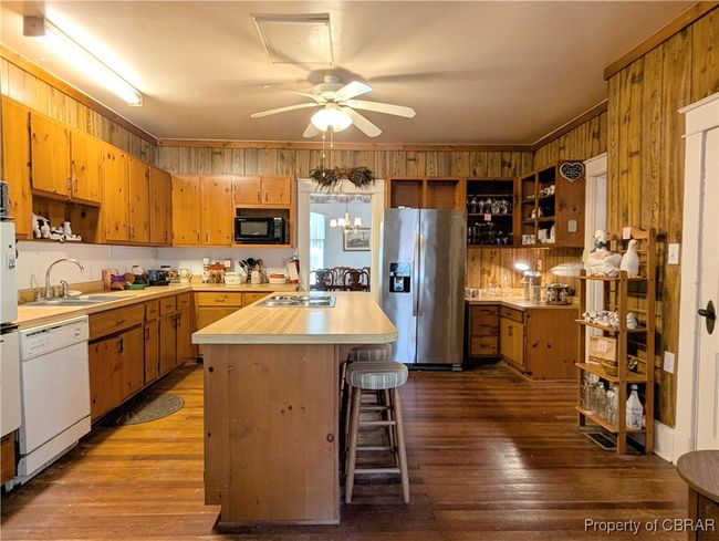 Kitchen with loads of cabinets for storage | Image 21