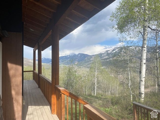 Wooden terrace with a mountain view | Image 15