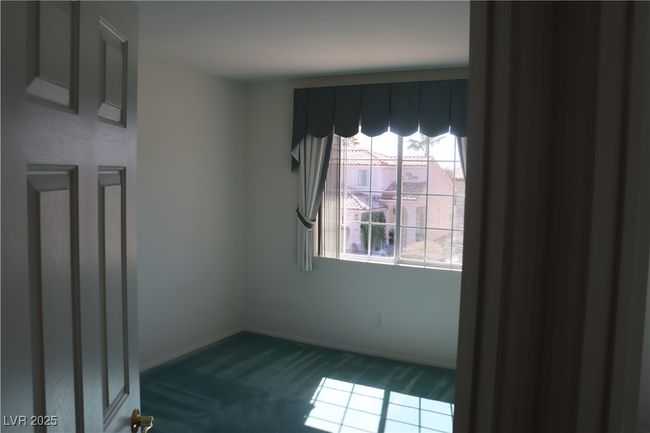 Unfurnished room featuring carpet flooring and baseboards | Image 51