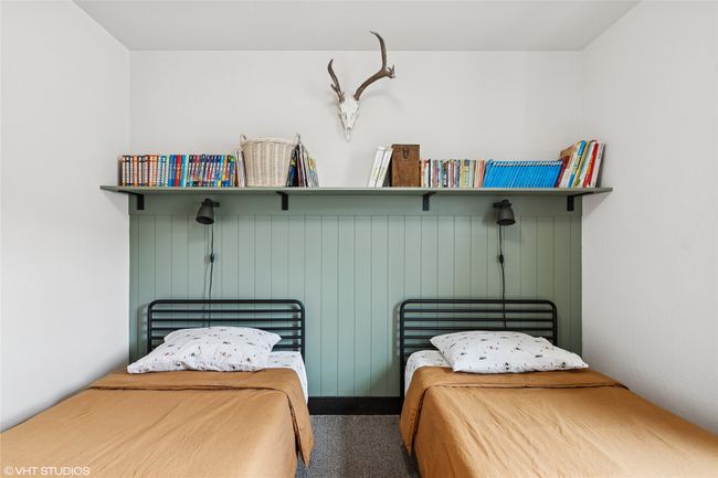 Bedroom featuring carpet | Image 31