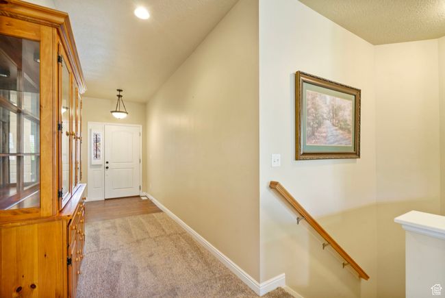 Hall with baseboards, carpet flooring, an upstairs landing, and recessed lighting | Image 18