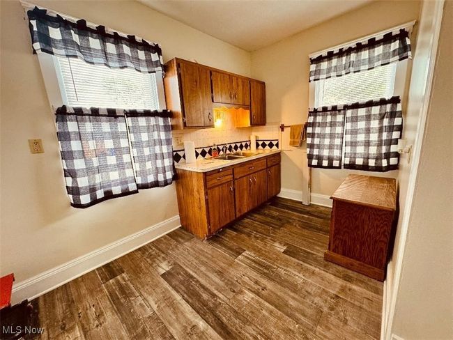 Updated kitchen with new lvp flooring and fresh paint. | Image 5
