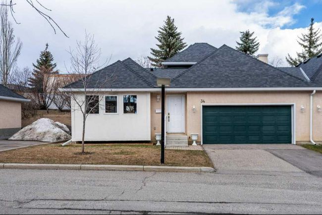 34 Candle Terrace Sw, Home with 2 bedrooms, 1 bathrooms and 4 parking in Calgary AB | Image 1