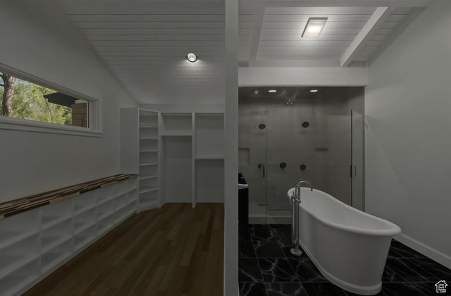 Optional full bath featuring a stall shower, wood ceiling, finish floor, a soaking tub, and baseboards | Image 8