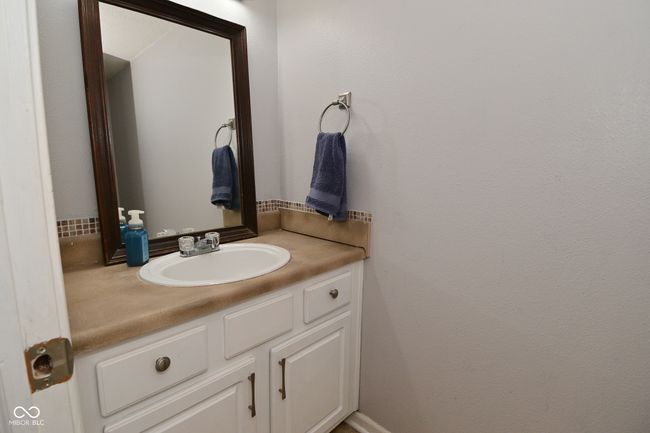 bathroom with vanity | Image 24
