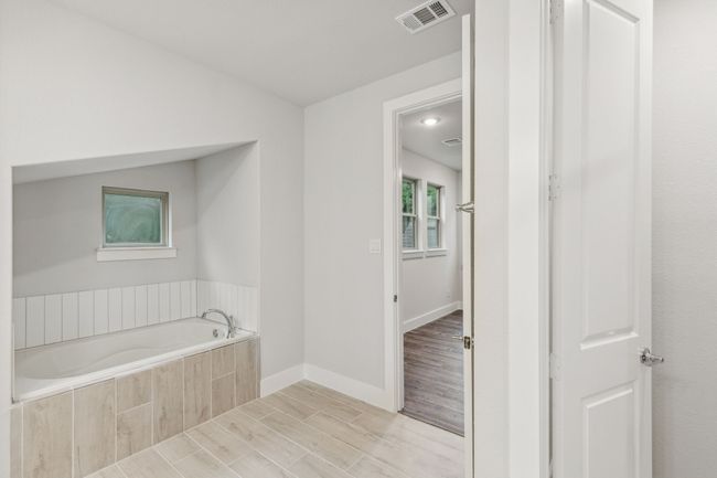 Primary Bathroom with Full bath with garden tub and tile | Image 28