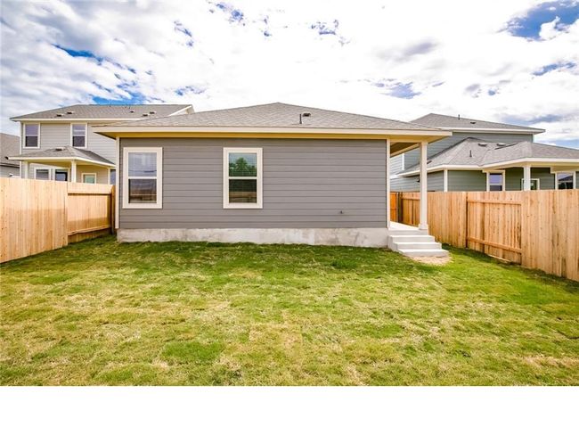 Rear view of property with a fenced backyard | Image 23