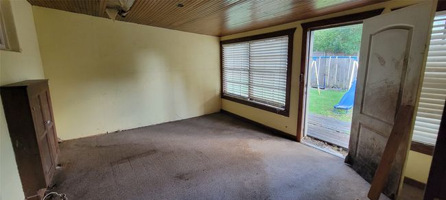 View of carpeted spare room | Image 27
