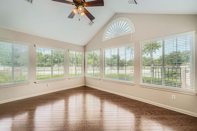 Sunroom/additional living area w/ vaulted ceiling | Image 10