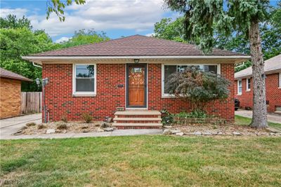 View of front of home featuring a front yard | Image 1