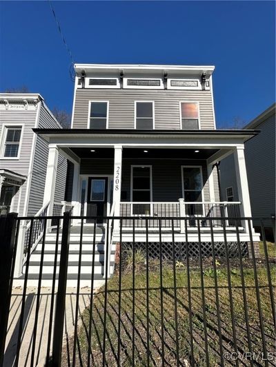 Italianate home featuring covered porch | Image 1