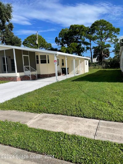 2383 Coconut Palm Drive Ne, House other with 2 bedrooms, 2 bathrooms and null parking in Palm Bay FL | Image 2