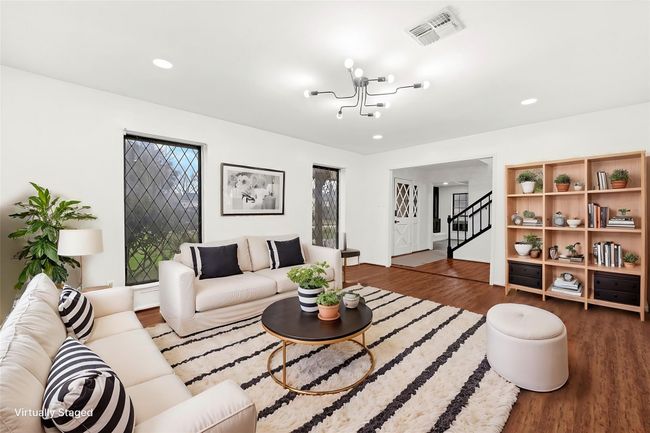 Virtual Staged: Common Area or additional flex room off the front of the home could be used for many purposes. | Image 7