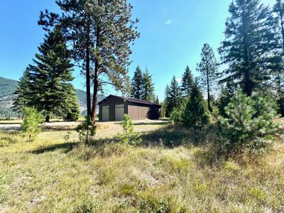 View of yard featuring an outbuilding and a mountain view | Image 3