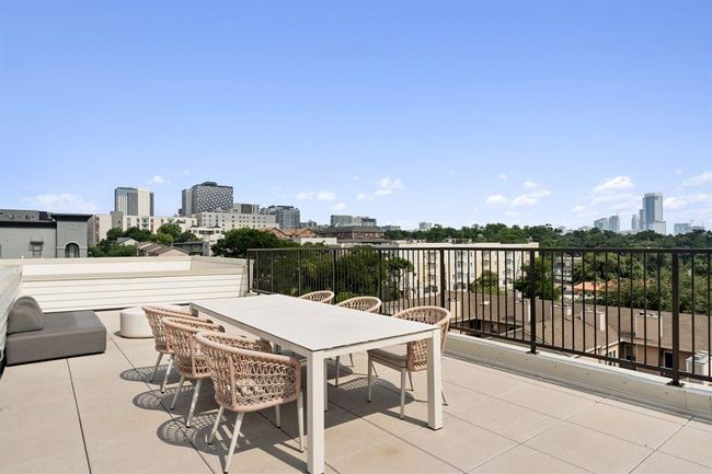 Patio / terrace featuring a skyline view | Image 35