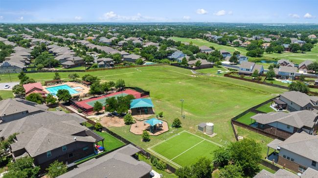 Aerial view of residential area with a pool area and a golf club | Image 40