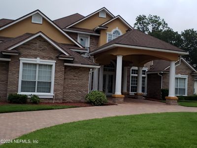 Lovely Custom Brick Home | Image 1