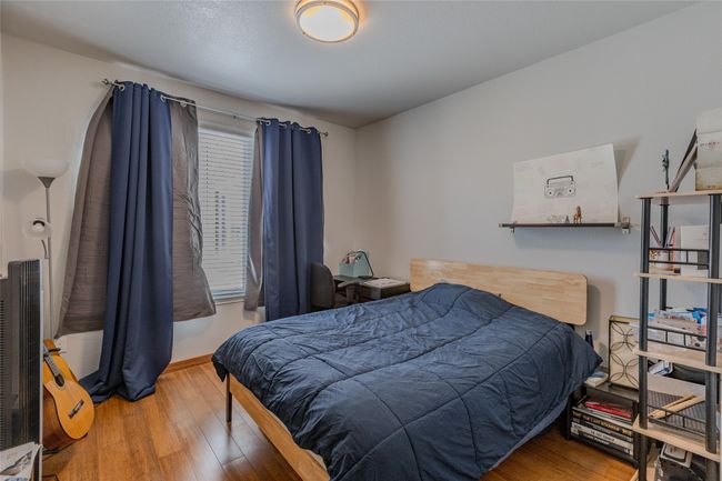 Bedroom with wood finished floors | Image 20