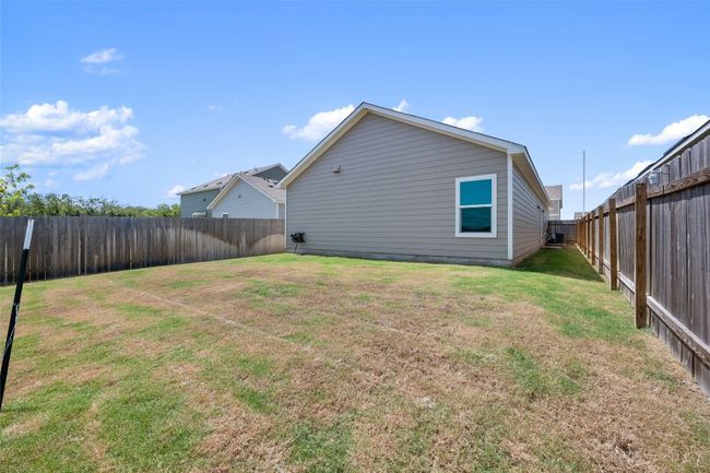 Back of property with a fenced backyard | Image 32