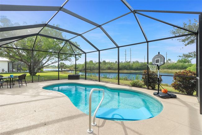 Pool with a view of the lake | Image 4