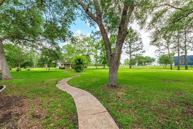 walkway from main house to the second home | Image 27