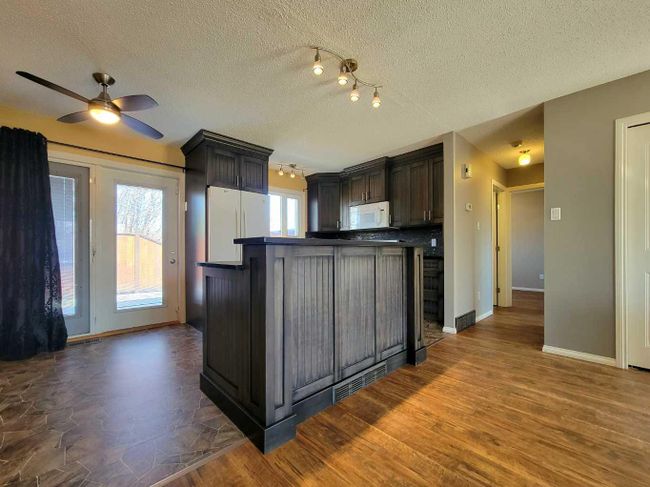 9406 81 Avenue, Home with 4 bedrooms, 2 bathrooms and 2 parking in Grande Prairie AB | Image 9