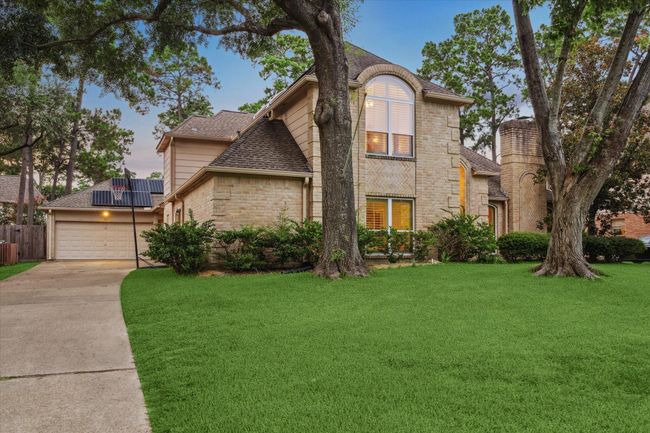 The oversized garage has plenty of workshop space and the owned solar panels will save you a considerable amount on your electricity costs. | Image 36