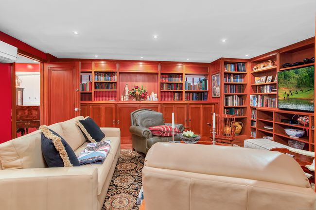 Prepare to be amazed at the craftmanship of the custom woodwork in the two rooms in the lower level. | Image 11