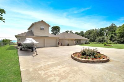 Home has an Attached One Car Garage and there is Detached 3 Car Garage | Image 3