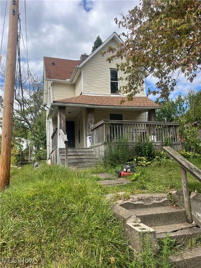 Back of house featuring a deck | Image 1