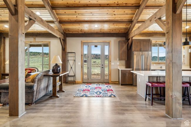 Foyer featuring beam ceiling, wooden ceiling, light wood-type flooring, and recessed lighting | Image 35