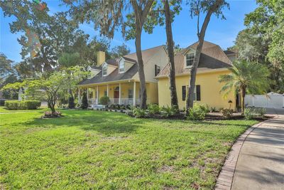 8608 Poinsettia Drive, House other with 4 bedrooms, 3 bathrooms and null parking in Temple Terrace FL | Image 2