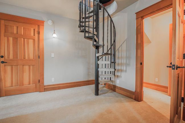 off of office- spiral staircase leading to the tower/turret | Image 42