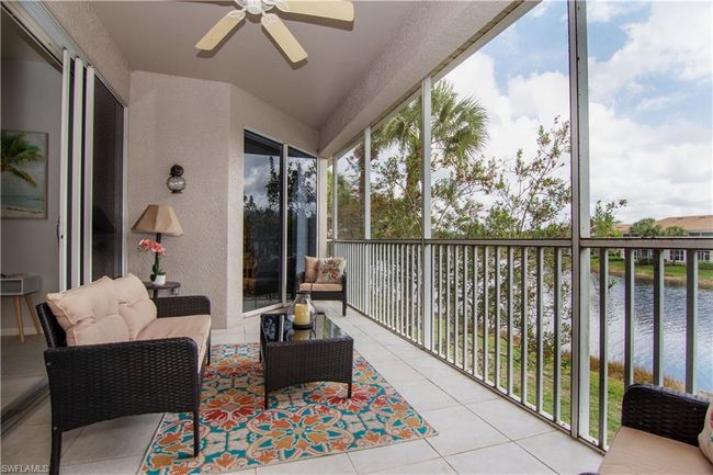 Gorgeous water views from your screened lanai with comfortable seating. | Image 18